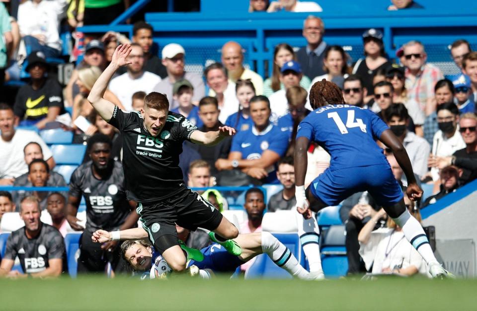 Harvey Barnes is tackled at Stamford Bridge (REUTERS)