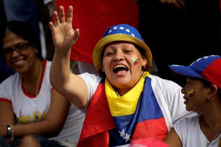 An opposition supporter shouts slogans during a rally to demand a referendum to remove Venezuela's President Nicolas Maduro in Caracas, Venezuela, Venezuela September 1, 2016. REUTERS/Marco Bello