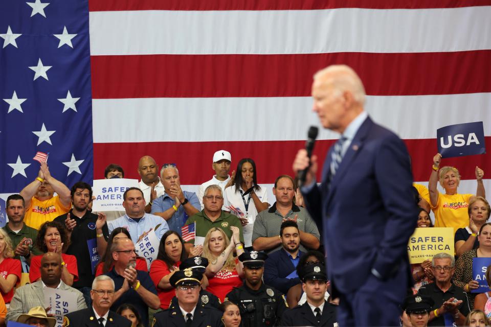 People listen as President Joe Biden speaks on his Safer America Plan at the Marts Center on August 30, 2022 in Wilkes-Barre, Pennsylvania.