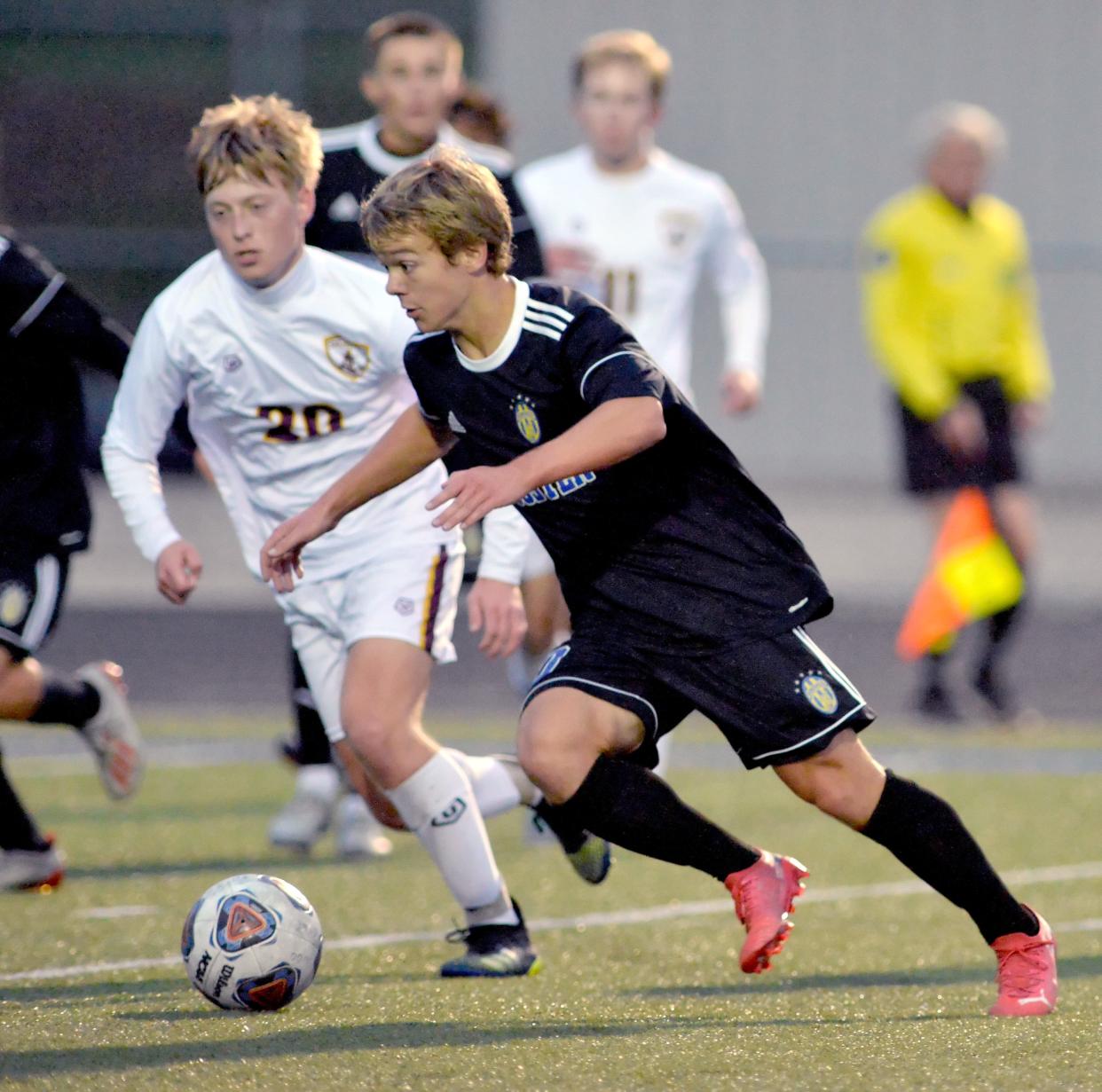 Wooster's Brendan French makes a move during the playoffs last season.