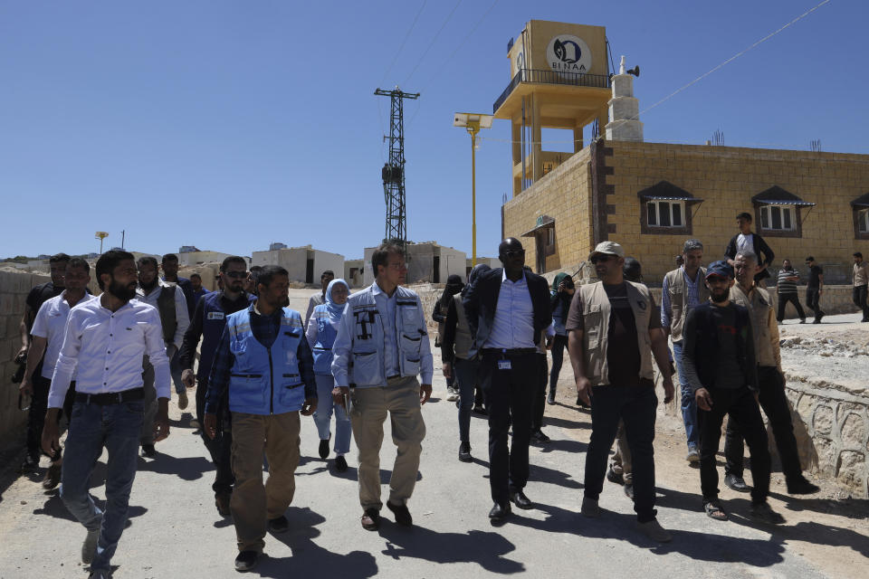 U.N. officials visit a camp in Idlib province, Syria, Wednesday, May 3, 2023. Three U.N. officials who visited Syria's Idlib province on Wednesday said some progress has been made but still more needs to be done to help the population in the rebel-held northwest that is home to some 4 million people. (AP Photo/Omar Albam)