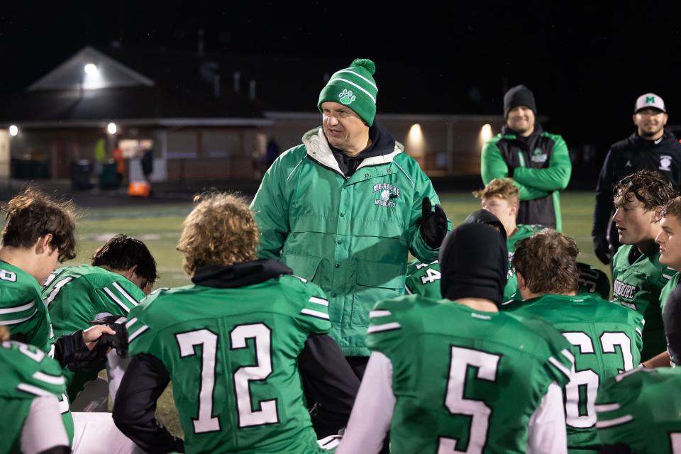 Mogadore coach Matt Adorni talks with his team after last year's regional semifinal win over Cuyahoga Heights.