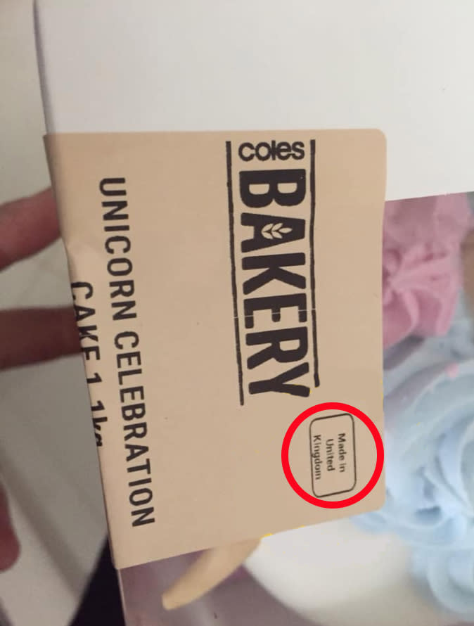 Pictured is a red circle around the made in the United Kingdom tag on a Coles cake. 