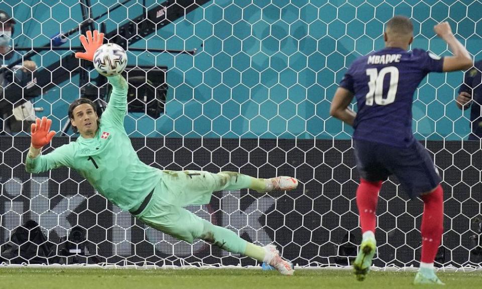 Switzerland’s goalkeeper Yann Sommer saves a penalty by France’s Kylian Mbappé during the Euro 2020 last-16 match.