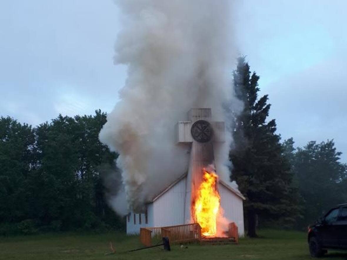 Our Lady of the Smile Church on Waterhen Lake First Nation was razed in a fire that RCMP has deemed suspicious. (Submitted by Doug Jeffrey - image credit)