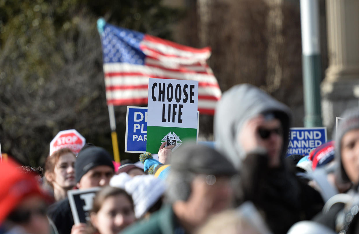 Anti-abortion protesters march in Washington, D.C.,&nbsp;at the annual March for Life in January. Official government language establishing that life begins at conception could tilt the scales toward more infringement on women's reproductive choices.