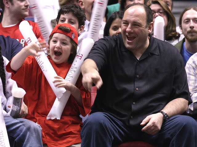 <p>James Devaney/WireImage</p> James Gandolfini with son Michael during Celebrities Attend Toronto Raptors vs. New Jersey Nets Game on May 4, 2007.