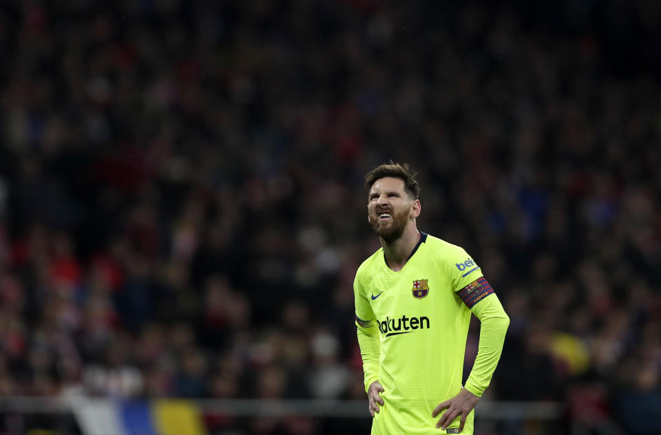 Barcelona's Lionel Messi reacts during a Spanish La Liga soccer match between Atletico Madrid and FC Barcelona at the Metropolitano stadium in Madrid, Saturday, Nov. 24, 2018. (AP Photo/Manu Fernandez)