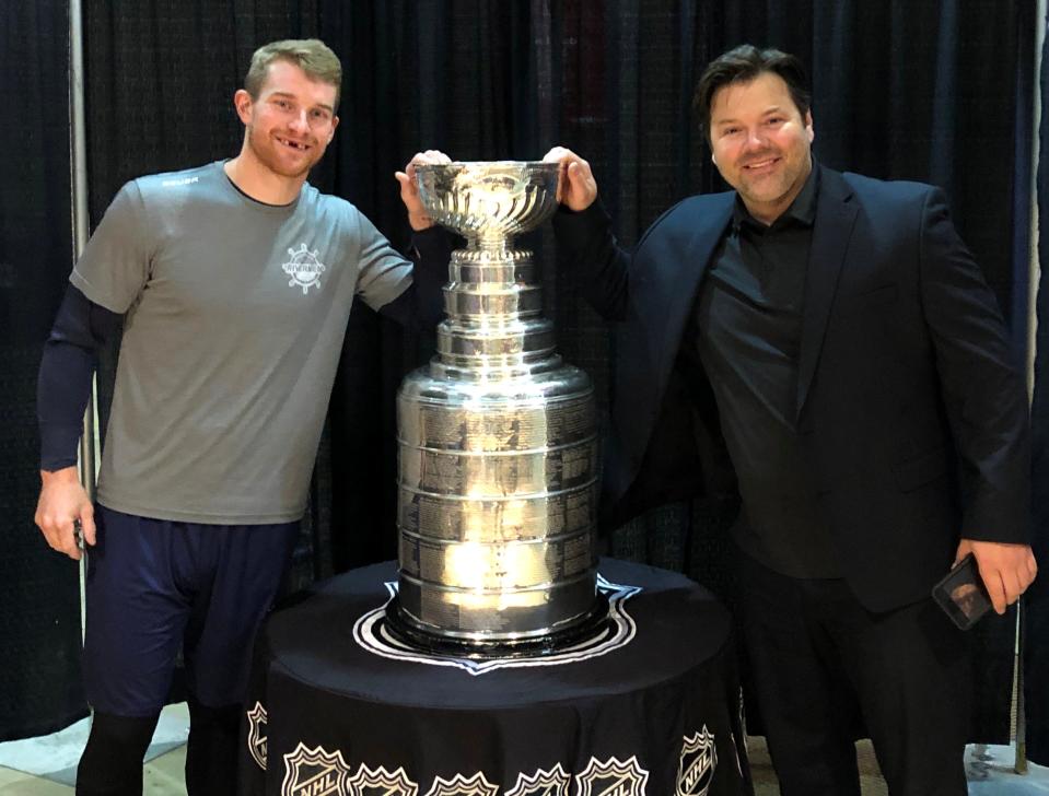 Rivermen captain Alec Hagaman and Rivermen head coach Jean-Guy Trudel with the Stanley Cup, when the NHL's prestigious championship trophy came to Carver Arena.