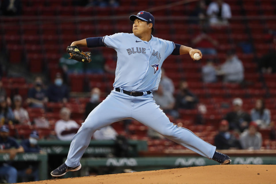 Toronto Blue Jays starting pitcher Hyun Jin Ryu delivers against the Boston Red Sox during the first inning of a baseball game Tuesday, April 20, 2021, at Fenway Park in Boston. (AP Photo/Winslow Townson)