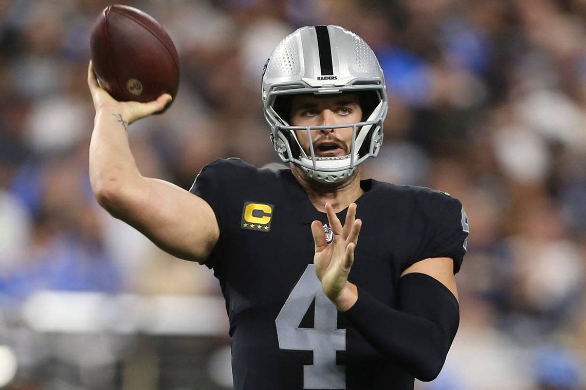 Las Vegas Raiders quarterback Derek Carr throws against the Los Angeles Chargers during the first half of an NFL game, Sunday, Jan. 9, 2022, in Las Vegas.