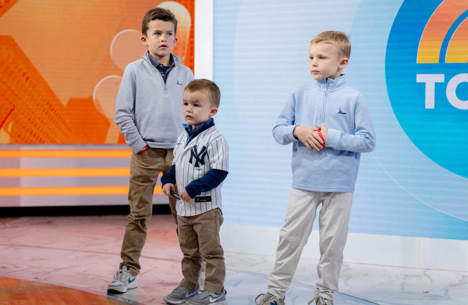 Oscar's brothers watch from the side on the TODAY set while he and his parents share their story. (Nathan Congleton / TODAY)