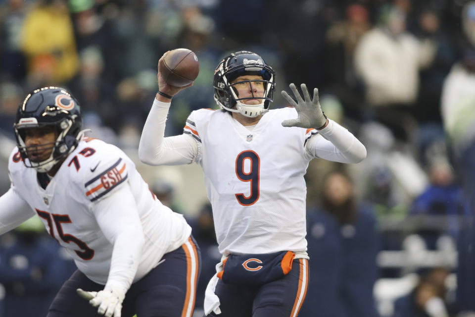 Chicago Bears quarterback Nick Foles (9) readies a throw against the Seattle Seahawks during the second half of an NFL football game, Sunday, Dec. 26, 2021, in Seattle. (AP Photo/Lindsey Wasson)