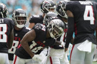 Atlanta Falcons wide receiver Russell Gage (14) celebrates after scoring a touchdown during the second half of an NFL football game against the Miami Dolphins, Sunday, Oct. 24, 2021, in Miami Gardens, Fla. (AP Photo/Hans Deryk)