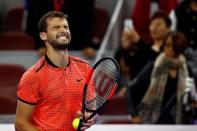 Tennis - China Open Men's Singles quarterfinal - Beijing, China - 07/10/16. Grigor Dimitrov of Bulgaria celebrates after he defeated Rafael Nadal of Spain. REUTERS/Thomas Peter