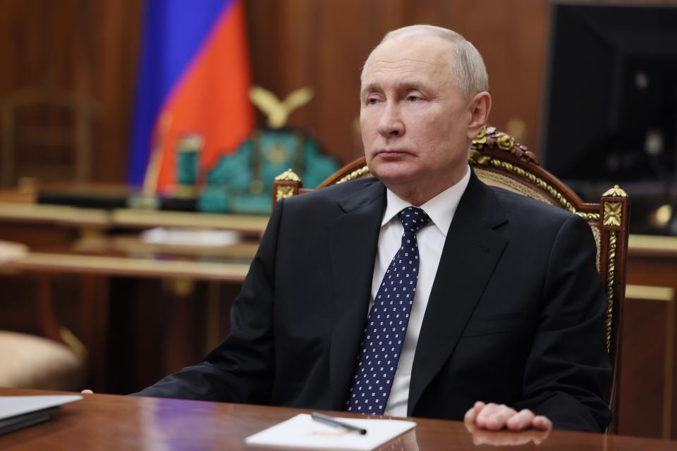 Russian President Vladimir Putin listens to Russian First Deputy Prime Minister Andrei Belousov during their meeting at the Kremlin, in Moscow, Russia, Tuesday, Nov. 7, 2023. (Gavriil Grigorov, Sputnik, Kremlin Pool Photo via AP)