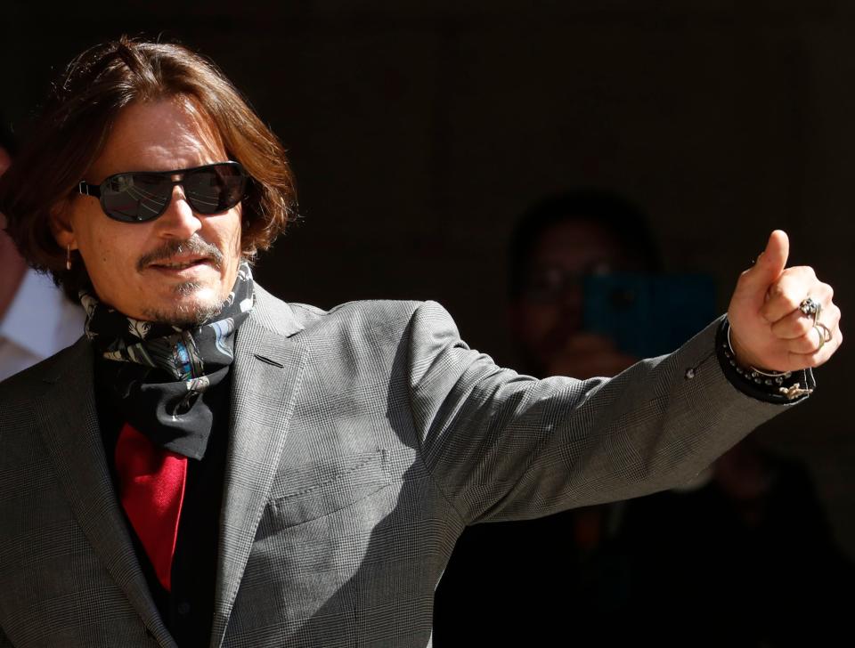 Johnny Depp arrives at the High Court in London, Tuesday, July 21, 2020.