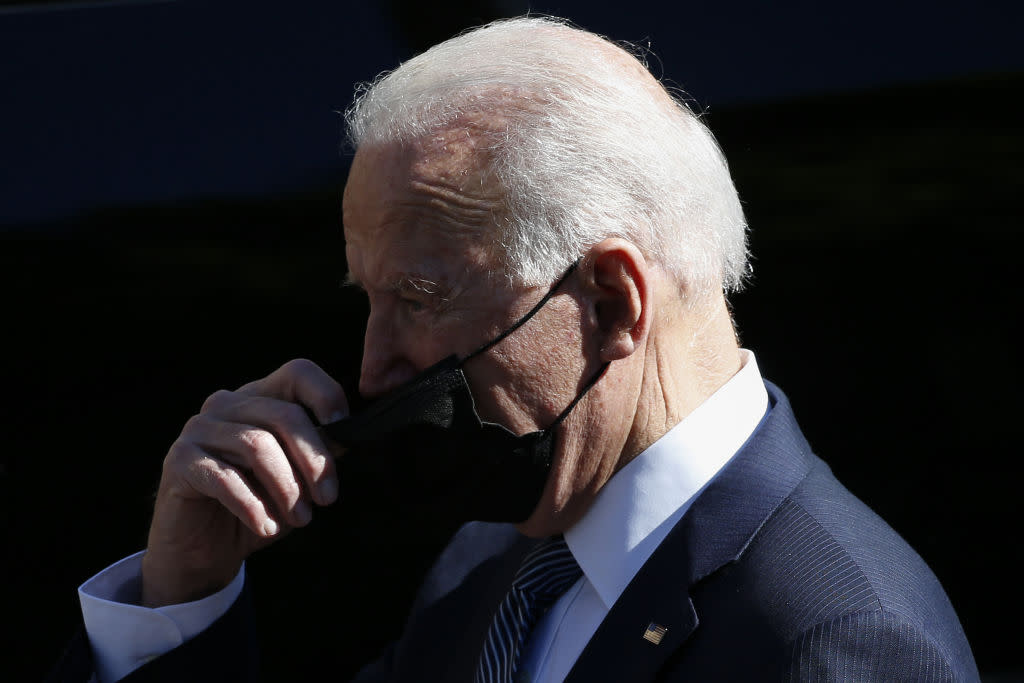 U.S. President Joe Biden adjusts his face mask after attending a Sunday service at Sacred Heart and St. Ia Catholic Church in St Ives on the final day of the Group of Seven leaders summit in Carbis Bay, U.K., on Sunday, June 13, 2021.