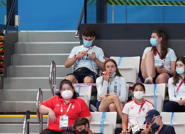 Tom Daley knitting in the stands during the Tokyo Olympics three years ago 