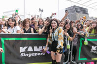 Chung Ha poses with fans. (PHOTO: Kamp Singapore)