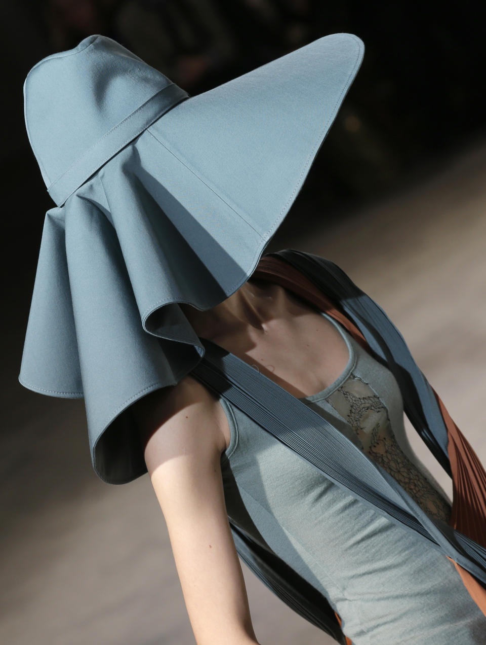 A model wears a creation by Japanese fashion designer Yohji Yamamoto for his Fall/Winter 2013-2014 ready to wear collection, in Paris, Friday, March 1, 2013. (AP Photo/Christophe Ena)