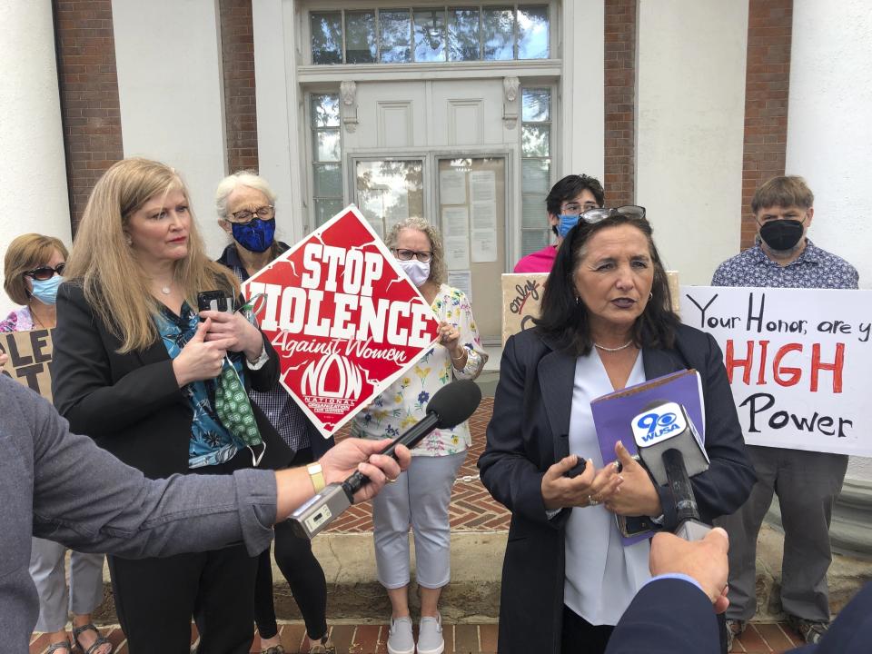 FILE - Loudoun County, Va., Commonwealth's Attorney Buta Biberaj, right, speaks to media, Sept. 23, 2021, in Leesburg, Va. Incumbent Biberaj, one of three prosecutors in northern Virginia who faced tough challenges after being elected four years ago on a reform agenda, won her Democratic primary on Tuesday, June 20, 2023, over challenger Elizabeth Lancaster. (AP Photo/Matthew Barakat, File)