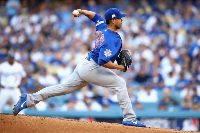 Jose Quintana of the Chicago Cubs throws a pitch against the Los Angeles Dodgers during the first inning in Game One of the National League Championship Series, at Dodger Stadium in Los Angeles, California, on October 14, 2017