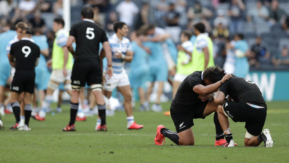 New Zealand's Caleb Clarke and Ardie Savea, right, react following the Tri-Nations rugby test between Argentina and New Zealand at Bankwest Stadium, Sydney, Australia, Saturday, Nov.14, 2020.Argentina defeated the All Blacks 25-15. (AP Photo/Rick Rycroft)