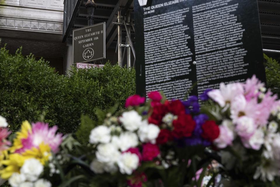 A sign of The Queen Elizabeth II 9/11 Garden is seen after the death of Britain's longest-serving monarch Queen Elizabeth II, Friday, Sept. 9, 2022, in New York. (AP Photo/Yuki Iwamura)