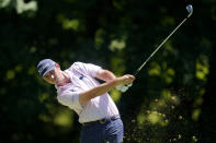 J.T. Poston hits off the sixth tee during the final round of the John Deere Classic golf tournament, Sunday, July 3, 2022, at TPC Deere Run in Silvis, Ill. (AP Photo/Charlie Neibergall)