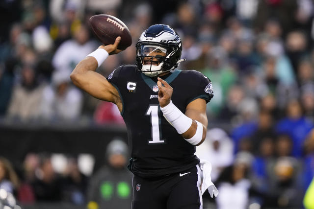 Philadelphia Eagles quarterback Jalen Hurts (1) reacts after a touchdown  against the New York Giants during an NFL football game Sunday, Dec. 11,  2022, in East Rutherford, N.J. (AP Photo/Adam Hunger Stock