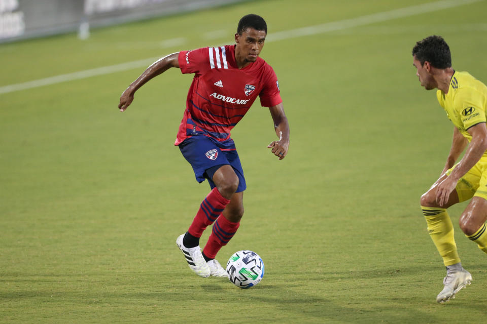 FC Dallas defender Reggie Cannon was the subject of death threats after teams took a knee during the national anthem with fans in attendance. (George Walker/Icon Sportswire via Getty Images)