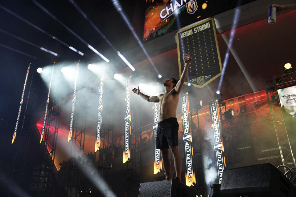 Vegas Golden Knights right wing Reilly Smith celebrates during a rally after a parade along the Las Vegas Strip for the NHL hockey champions Saturday, June 17, 2023, in Las Vegas. (AP Photo/John Locher)