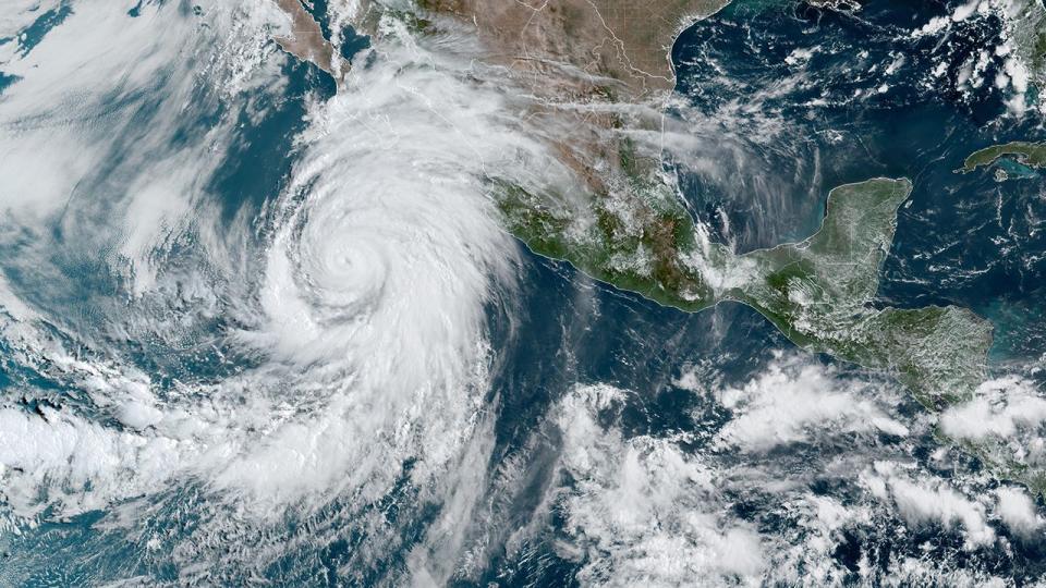 This satellite image taken on Friday shows Hurricane Hilary spinning off the coast of Mexico.