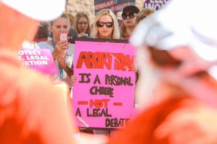 Abortion-rights activists gather at a rally to protest abortion bans at Arizona state Capitol in Phoenix on May 21, 2019.