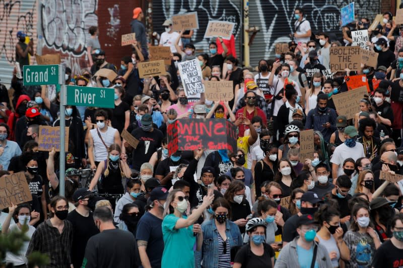 People take part in a Black Lives Matter protest in the Brooklyn borough of New York City