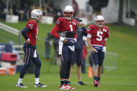 New England Patriots quarterbacks Jake Dolegala, left, Cam Newton (1), and Brian Hoyer (5) stand together during an NFL football practice, Thursday, Aug. 5, 2021, in Foxborough, Mass. (AP Photo/Steven Senne)