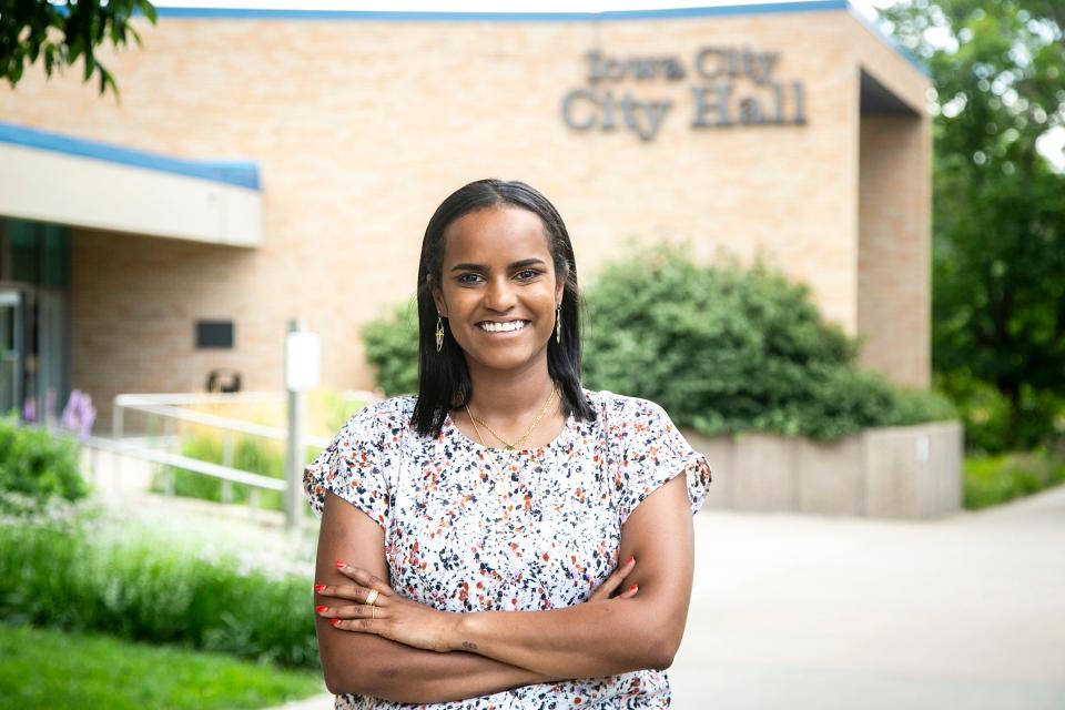 Amel Ali, posing Friday in Iowa City, is the new chair of the Ad Hoc Truth and Reconciliation Commission.