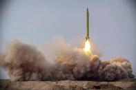 In this photo released on Saturday, Jan. 16, 2021, by the Iranian Revolutionary Guard, a missile is launched in a drill in Iran. Iran’s paramilitary Revolutionary Guard conducted a drill Saturday launching anti-warship ballistic missiles at a simulated target in the Indian Ocean, state television reported, amid heightened tensions over Tehran’s nuclear program and a U.S. pressure campaign against the Islamic Republic. (Iranian Revolutionary Guard/Sepahnews via AP)