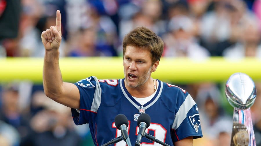 <em>Former New England Patriots quarterback Tom Brady speaks during the halftime ceremony of an NFL football game against the Philadelphia Eagles, on Sept. 10, 2023, in Foxborough, Mass. (AP Photo/Greg M. Cooper)</em>