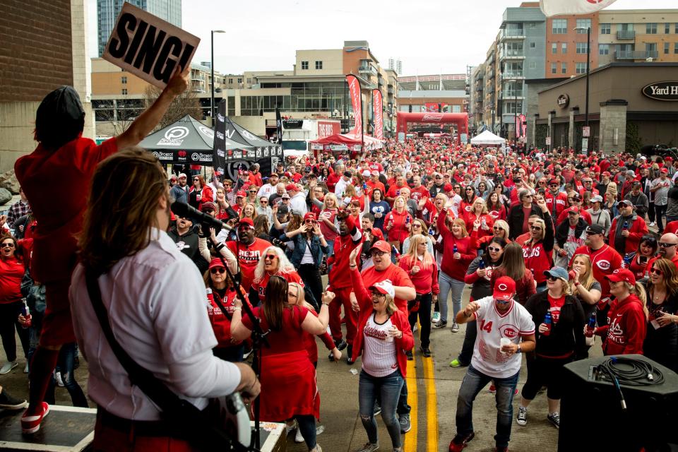 The Naked Karate Girls perform at the Reds Community Fund Charity Block Party for Cincinnati Reds Opening Day on Freedom Way in downtown Cincinnati Thursday, March 28, 2019. 