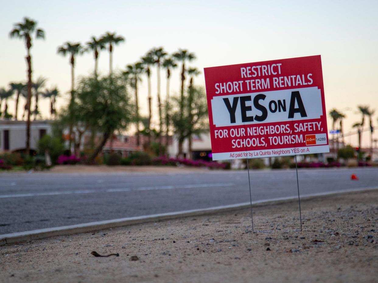 A sign encouraging voters to vote yes on measure A is seen along Highway 111 in La Quinta, Calif., Friday, Sept. 30, 2022. 