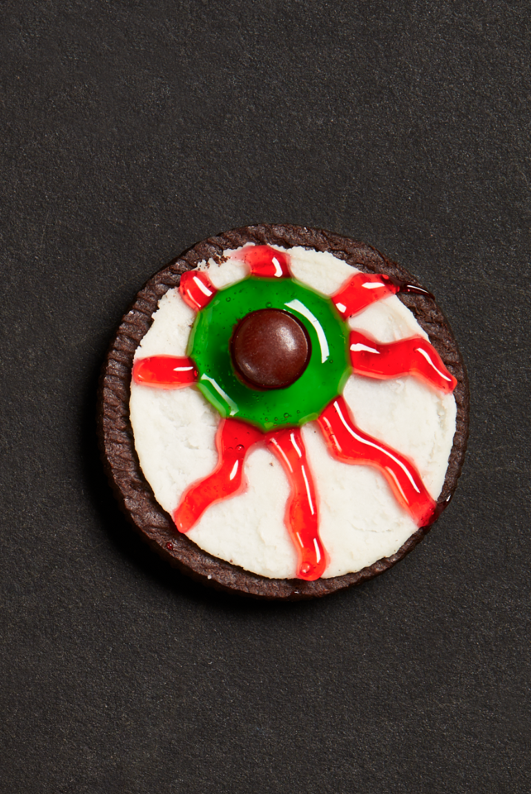 <p>These spooky eyeball cookies have no baking required. Just purchase your favorite sandwich cookies, twist apart, and decorate to your heart's content. </p><p><strong><em>Get the recipe at <a href="https://www.thepioneerwoman.com/food-cooking/recipes/a32129658/sandwich-cookie-eyeballs-recipe/" rel="nofollow noopener" target="_blank" data-ylk="slk:The Pioneer Woman;elm:context_link;itc:0;sec:content-canvas" class="link ">The Pioneer Woman</a>. </em></strong></p>