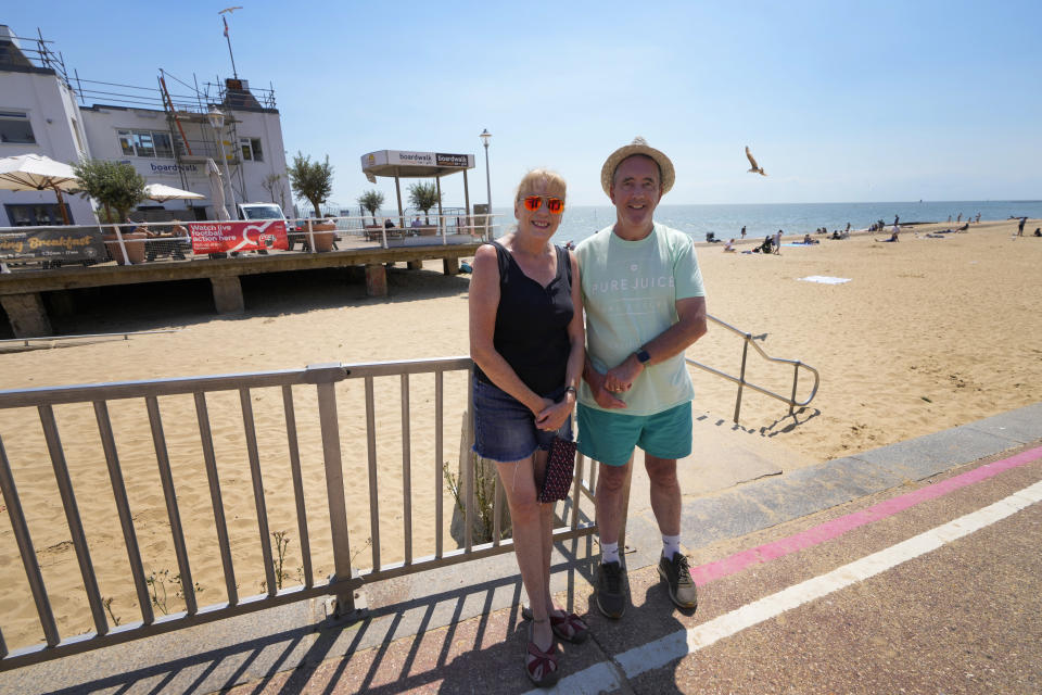 Voters Janet and Sean Clancy stand in Clacton-On-Sea, England, Friday, June 21, 2024. Like many others in the seaside town, they feel a deep sense of disillusionment with the governing Conservatives. Instead, they will vote for the anti-immigration Reform UK party in next week's national election. (AP Photo/Kirsty Wigglesworth)
