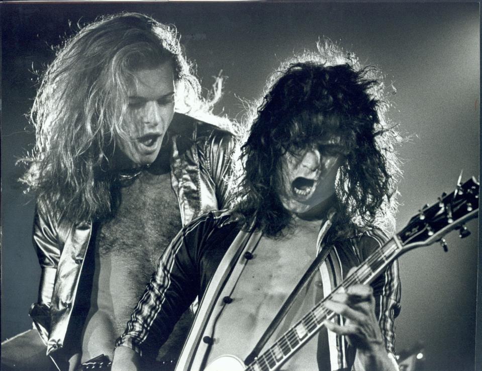 David Lee Roth and Eddie Van Halen of rock band Van Halen celebrate Sunday, July 9th, 1978 at the Long Beach Arena during the rock band's return to town. Eddie Van Halen has died at age 65 of cancer.