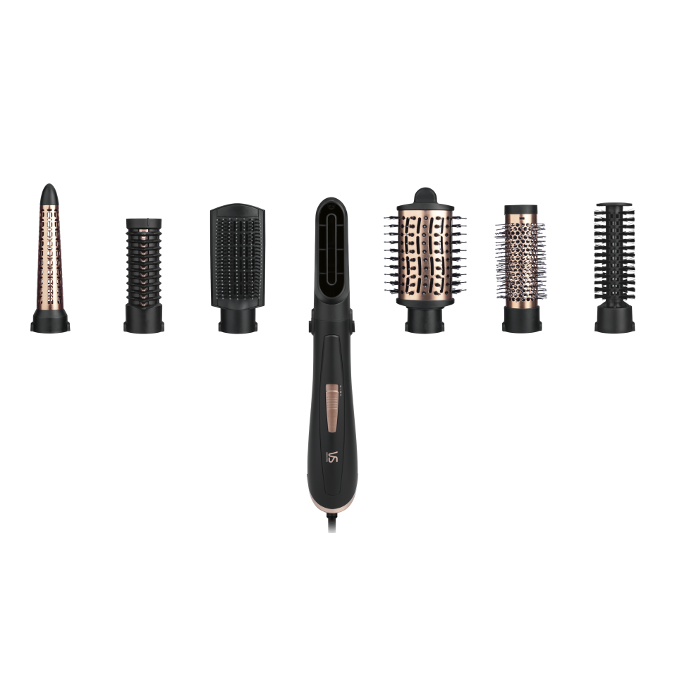 A black hair styling wand sits with six attachments on a white background