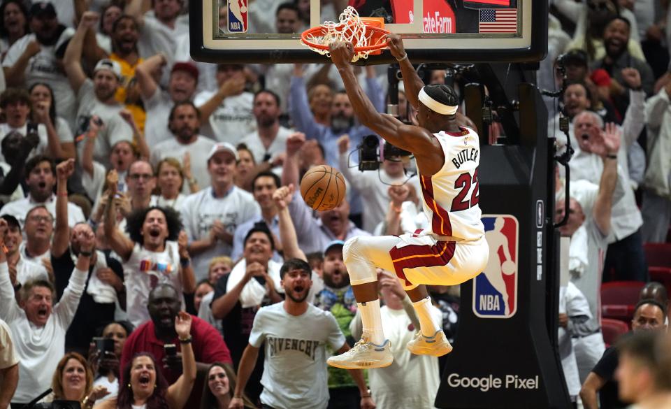 Miami Heat forward Jimmy Butler dunks in the fourth quarter against the Milwaukee Bucks. Butler scored a career-high 56 points in the Heat's 119-114 comeback victory in Game 4 of the first-round playoff series.