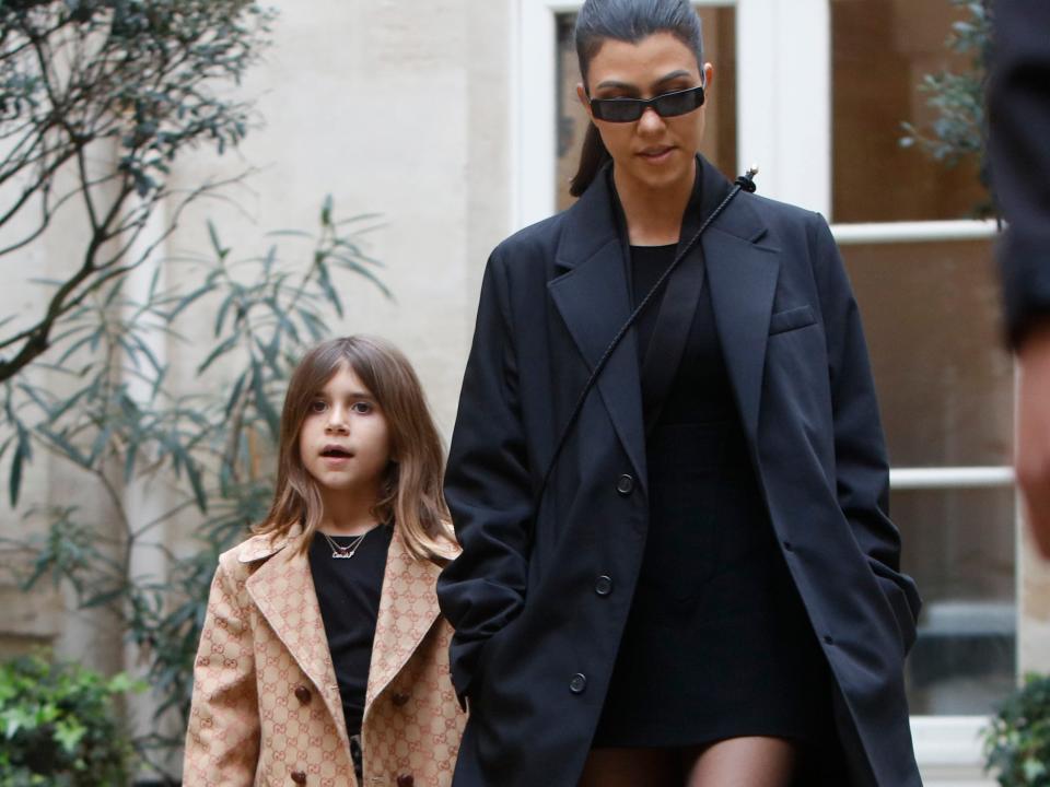 Kourtney Kardashian and Penelope Disick walk hand-in-hand in 2020.