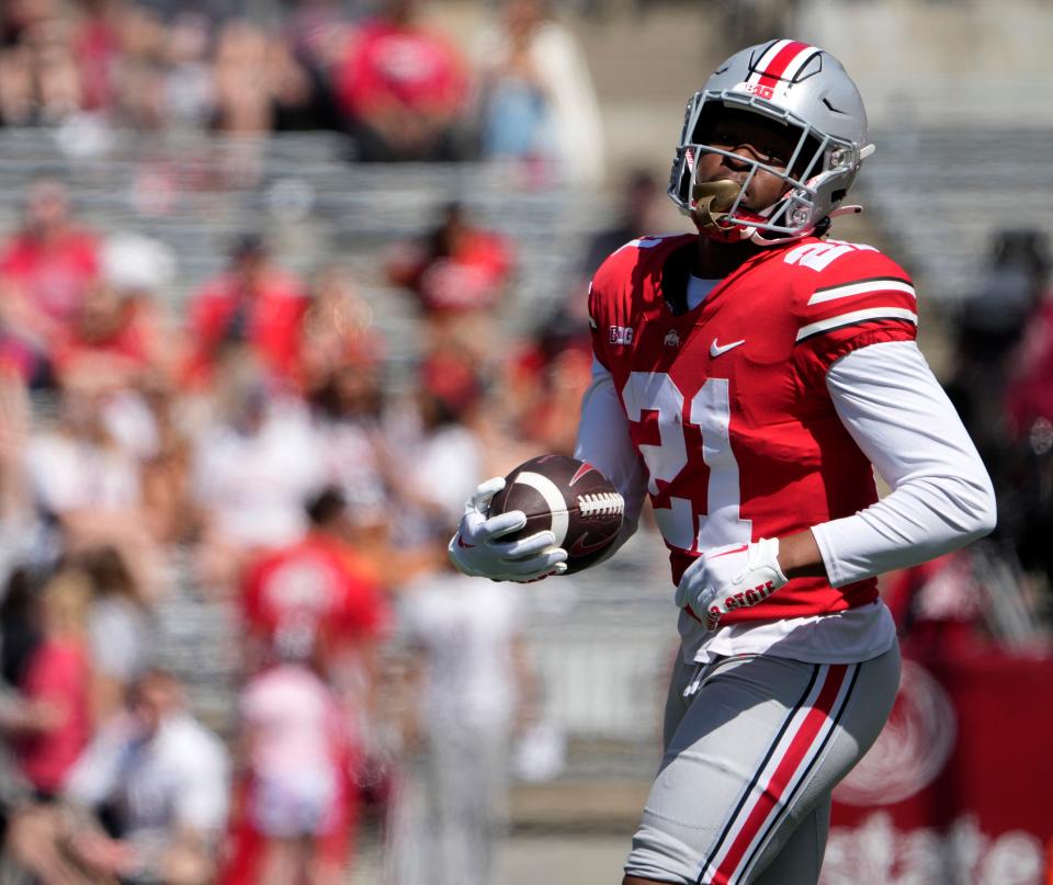 April 15, 2023; Columbus, Ohio, USA;  Running back Evan Pryor (21) warms up before the Ohio State spring football game Saturday at Ohio Stadium.Mandatory Credit: Barbara J. Perenic/Columbus Dispatch