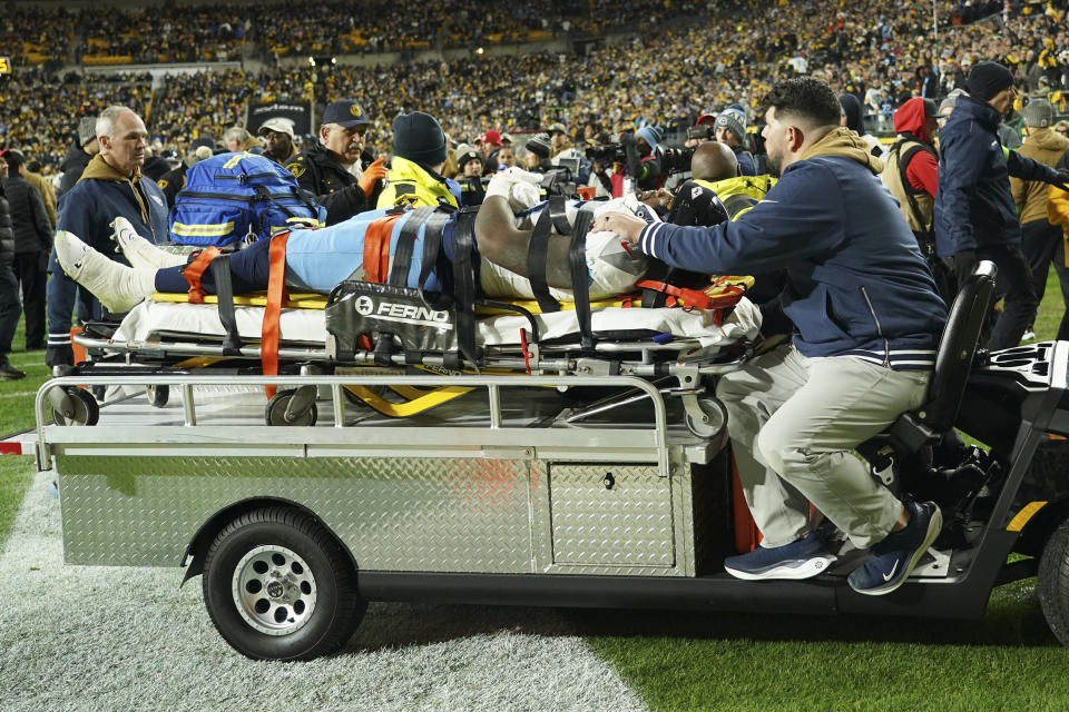 Tennessee Titans wide receiver Treylon Burks is carted off the field after being injured during the second half of an NFL football game against the Pittsburgh Steelers, Thursday, Nov. 2, 2023, in Pittsburgh. (AP Photo/Matt Freed)